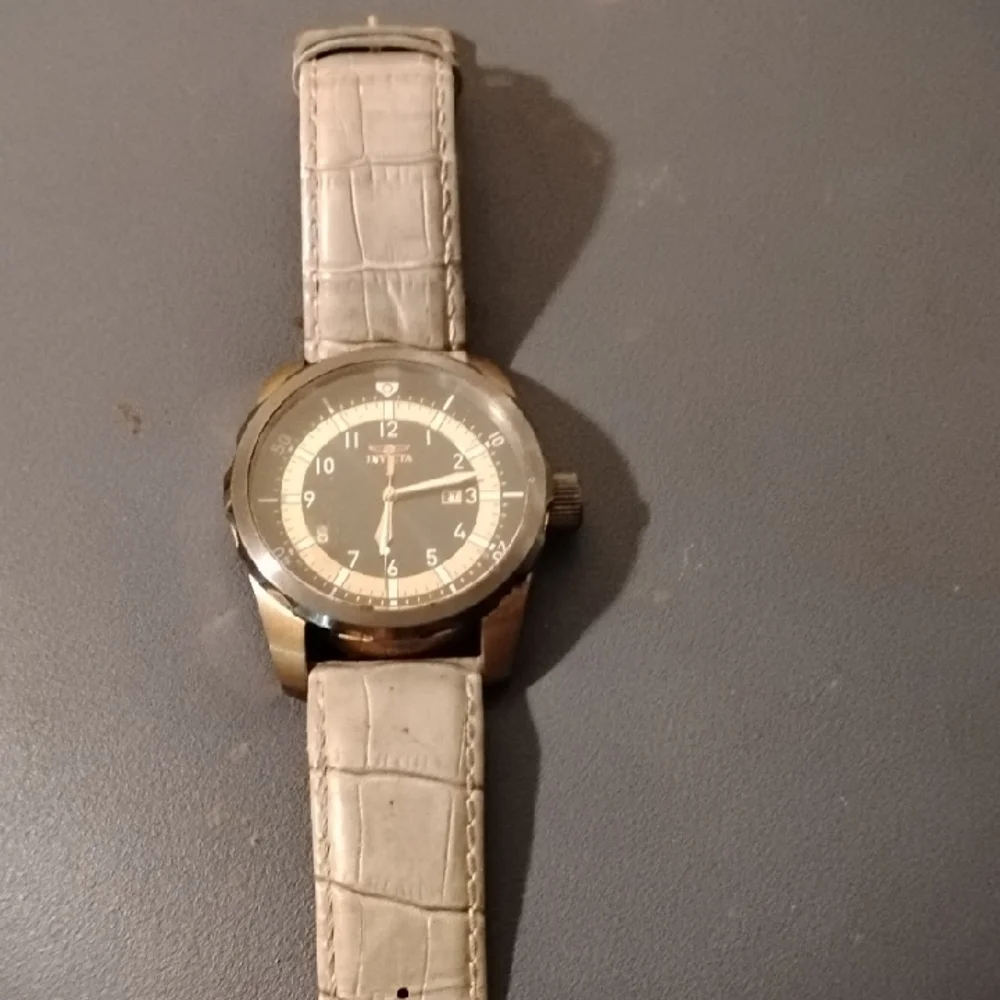 Invicta Black and Gold Wristwatch